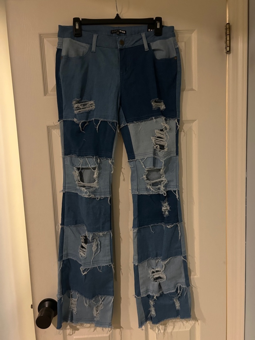 Fashion Nova Two-Tone Distressed Patchwork Flare Jeans - Blue
